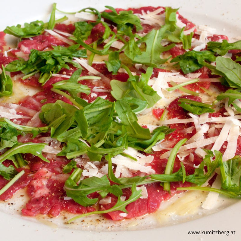Hirsch-Carpaccio mit Rucola, Parmesan und Feigensenf-Vinaigrette - kumitzborgo.shop